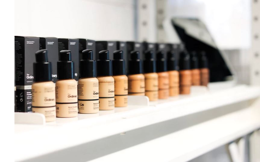 How to prevent buyer's remorse? Allow testing. This photo shows  various foundation products displayed on a shelf.
