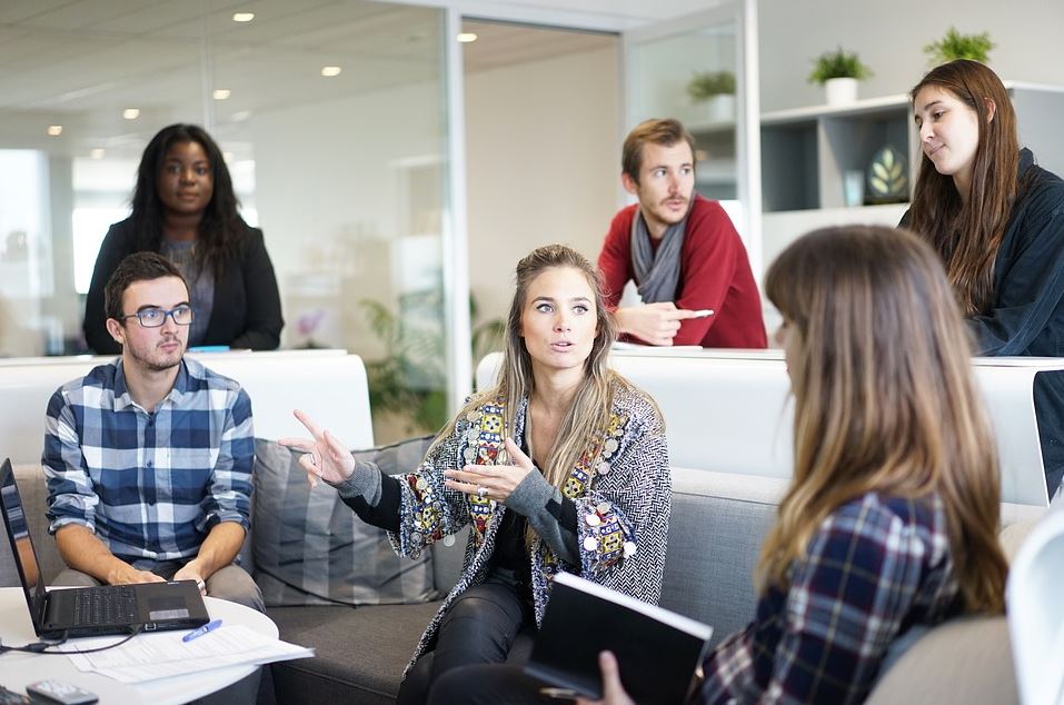 Image shows colleagues in discussion